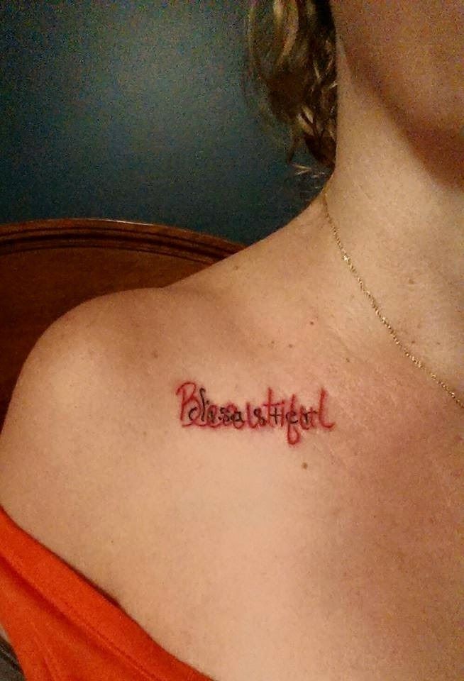 a woman with a tattoo on her chest that says, pleasestfrutt