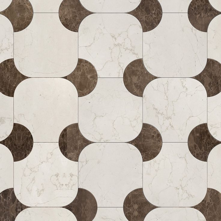 a white and brown tiled floor with circles on the top, in an irregular pattern