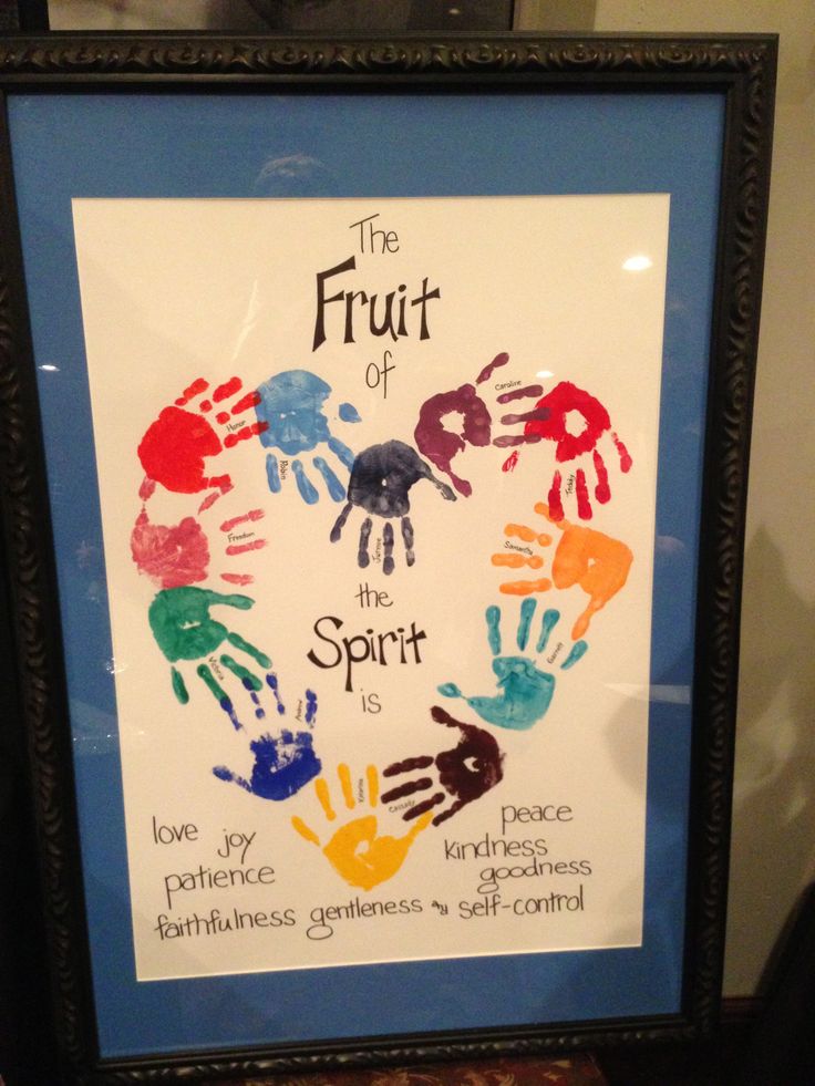 the fruit of the spirit is handprinted with children's hands