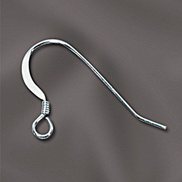 a pair of metal hooks on a gray background