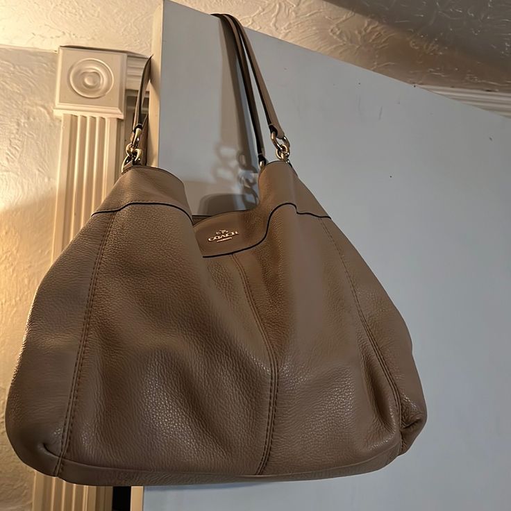 Tan Leather Bag Never Used! Like New Taupe Soft Leather Shopping Bag, Coach Beige Soft Leather Satchel, Coach Soft Leather Beige Satchel, Classic Taupe Shoulder Bag With Handles, Taupe Shoulder Bag With Handles, Chic Coach Bags For Everyday Use, Classic Taupe Shoulder Bag, Coach Everyday Bucket Satchel, Coach Bucket Satchel For Everyday