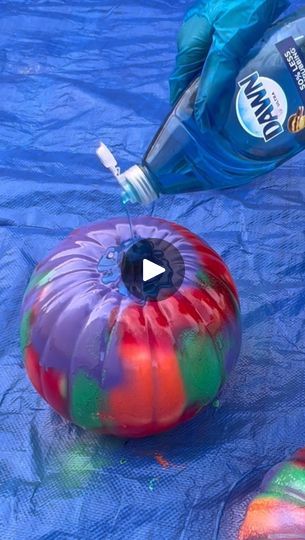 an inflatable ball is being used to make a watermelon pool float