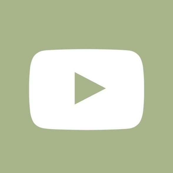 a green background with a white play button on the bottom right corner and an arrow in the middle