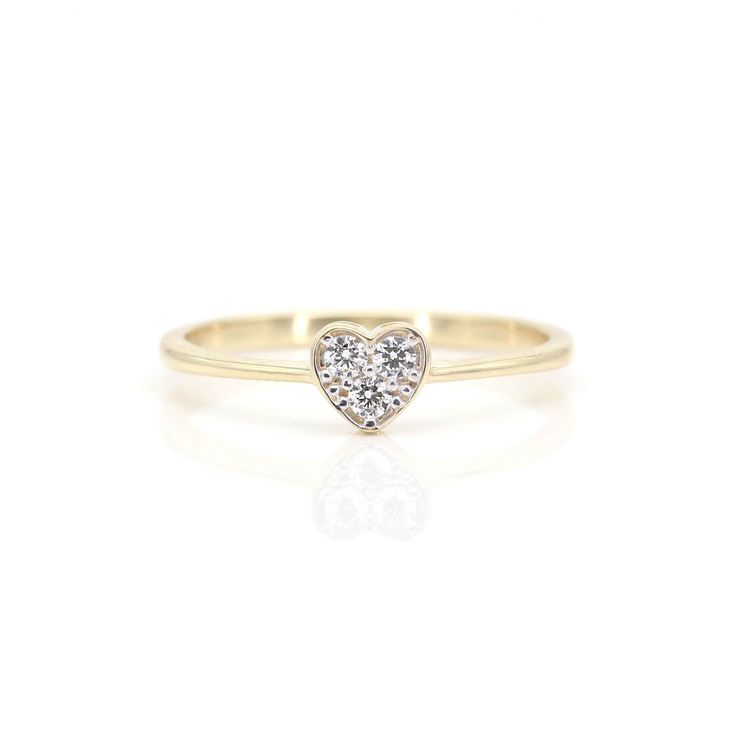 14k Diamond Heart Ring | Real Diamond Ring | Real Gold Heart Shaped Ring | April Birthstone Ring | Tiny Ring | Yellow Gold Ring | Mini Ring P R O D U C T 𝄪 D E T A I L S ✽ Metal: 14k Yellow Gold ✽ Gold Weight: approx. 1.4g ✽ Bottom Band Width: 1.7 MM ✽ Diamond Size: 2.0 mm x 3pc (total 0.10ct) ✽ Diamond Color: G ✽ Diamond Clarity: VS2-SI1 ✽ Made to Order O T H E R 𝄪 I N F O R M A T I O N ▪ All items are custom made to order ▪ Rush order: Please contact us before place your order to ensure that Promise Heart Stackable Ring In Fine Jewelry, Promise Heart Ring Stackable Fine Jewelry, Delicate 14k Gold Heart-shaped Ring, Stackable Heart-shaped Diamond Rings, 14k Gold Rings With Heart Charm And Heart Cut, Dainty 14k Gold Diamond Ring With Heart Cut, Dainty 14k Gold Heart Cut Diamond Ring, Diamond Stackable Heart Ring Perfect As A Gift, 14k Gold Heart-shaped Promise Ring