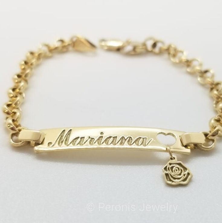 18K PERSONALIZED ID CHILDREN'S BRACELET  ⇢MATERIAL:  18K Gold          ⇢COLOR: Available in gold, white gold and rose. ⇢WEIGHT: approximately 5gr. *Since it is a handmade product, weight can vary* ⇢ LINKS: Please choose Portuguese Link, Flat Curb, Flat Figaro or Paper Clip link. ⇢LENGTH: 5.5 inches. Please specify if you want it in another length. ✰Since this is a hand-made product each piece has a slight variation. ✰ RETURNS & EXCHANGES: while we do not accept returns we will happily exchange the piece for another item of equal or higher value within 15 days of shipping date. ✰The piece is sent in a gift box to protect them during shipping and with a guarantee certificate with information on the piece ✰If you have any inquiries, send us a message and we'll get back to you as soon as possi Elegant Personalized Heart Bangle Bracelet, Luxury White Gold Heart Bracelet For Anniversary, Luxury Rose Gold Plated Charm Bracelet, Luxury Rose Gold Gold-plated Charm Bracelet, Rose Gold Plated Bracelets In Fine Jewelry Style, Luxury Engraved Rose Gold Bracelet, Luxury Polished Chain Bracelet As Gift, 14k Rose Gold Tarnish Resistant Bracelets, Luxury Polished Chain Bracelet Gift