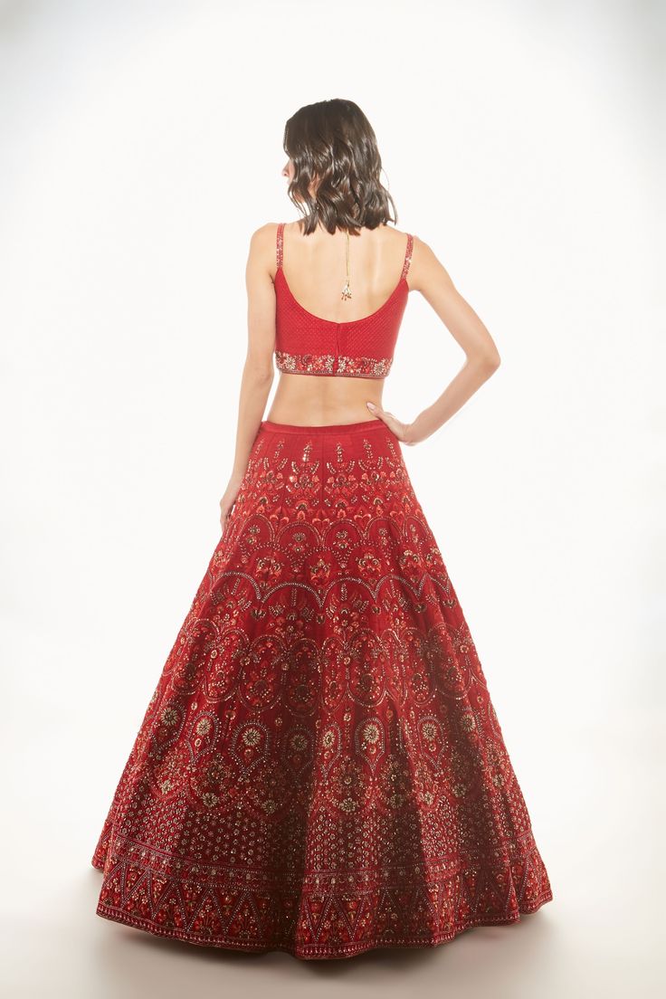 A red raw silk skirt with resham, sequins, and mirror embroidery paired with a quilted bralette and net dupatta From Chamee and Palak 's The Wedding Edit collectionDELIVERY TIMEPlease allow 8-12 weeks for your outfit to arrive.FABRIC DETAILSRaw silk and NetProfessional cleaning only. Wedding Edit, Raw Silk Lehenga, Mirror Embroidery, Corset Blouse, Silk Lehenga, Net Dupatta, Red Outfit, Silk Skirt, Modern Bride