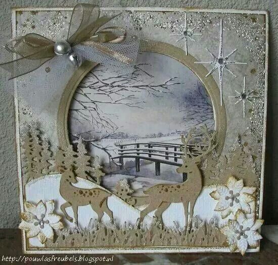 a christmas card with deer and snow scene