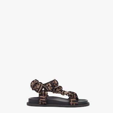 Flat sandals with wide bands. Made of stretch satin embellished with FF motif in brown and tobacco. Made in Italy. Size 35_5 Fendi Sandals, Fendi Logo Design, Dad Sandals, Fendi Store, Fendi Dress, Fendi Logo, Light Brown Leather, Brown Satin, Mothersday Gifts