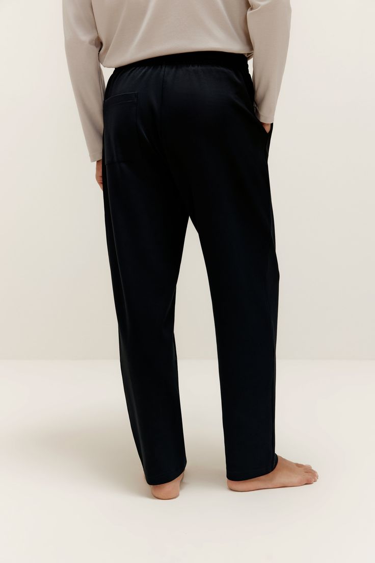 It's time to chill. Our Men’s Lounge Pants are tailored from an ultra-soft fabric blend with enhanced breathability to be exactly what you need for all the casual, relaxing evenings at home to come. Details Materials & Care Shipping & Returns • Soft fabric with a subtle sleek look, elastic waistband, and adjustable drawstring closure.• Front slant pockets, rear patch pocket: plenty room for your phone, keys, and wallet! Size M is 40.2" in length.• Available in three easy-to-match colors. • Mater Relaxed Fit Business Bottoms With Pockets, Relaxed Fit Bottoms With Pockets For Business, Business Pants With Pockets And Relaxed Fit, Business Pants With Pockets Relaxed Fit, Relaxed Fit Business Pants With Pockets, Relaxed Fit Tapered Leg Business Pants, Business Pants With Relaxed Fit And Tapered Leg, Relaxed Fit Business Pants, Business Pants With Relaxed Fit And Straight Hem