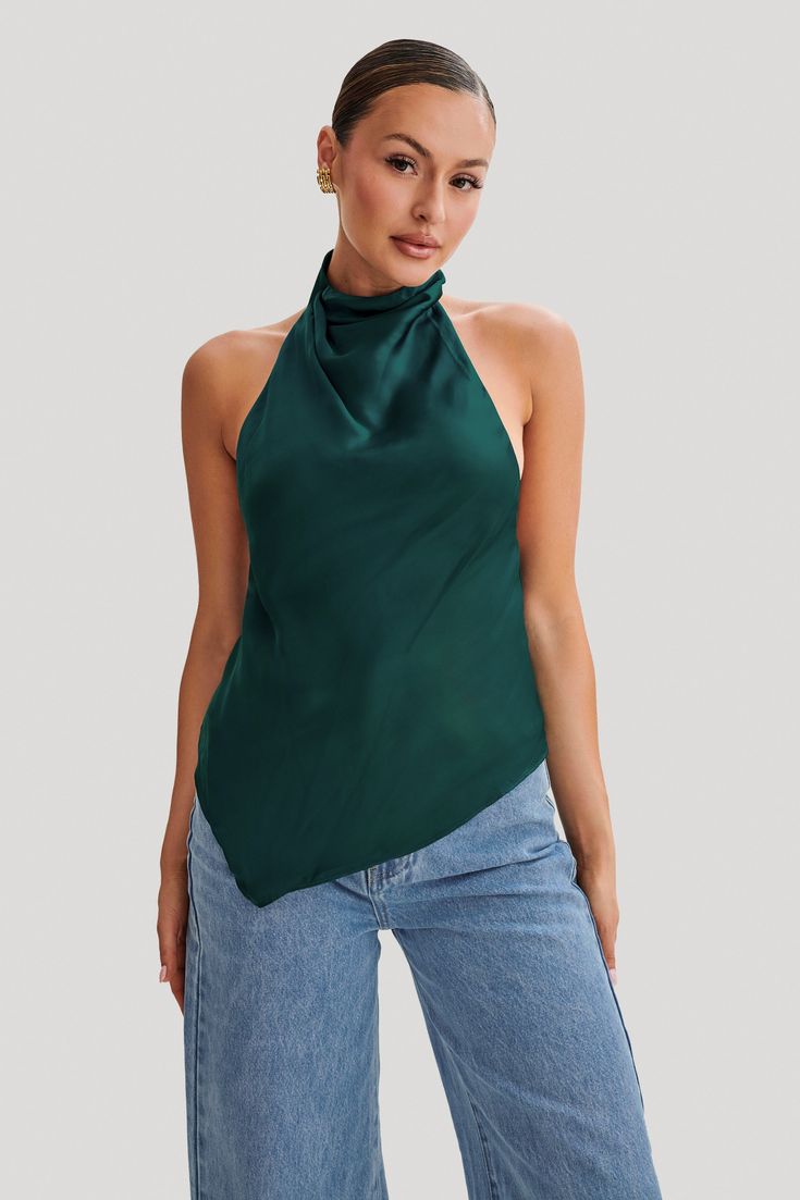 Elevate your everyday.Introducing the SERAPHINE Satin Halter Top, a vision of elegance and allure. Crafted to perfection, this top features a stunning halter neckline adorned with a graceful cowl detail, adding a touch of sophistication to your look. The low back design exudes understated glamour, while the asymmetrical hemline adds a modern twist. Complete with a delicate button closure at the neckline, it ensures a secure and stylish fit. Lined for comfort and coverage, this top promises a lux Capsule Wardrobe Basics, Maxi Dress Sale, Black Tie Wedding, Beige Dresses, Satin Top, The Low, Back Design, Low Back, Dressed Down