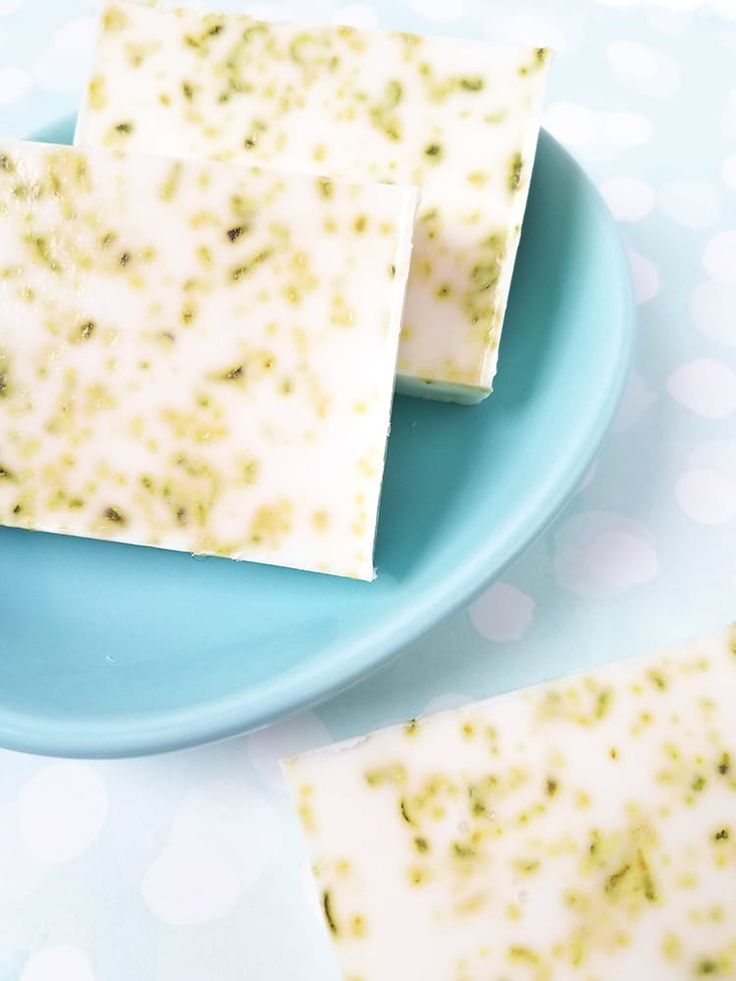 three pieces of soap sitting on top of a blue plate