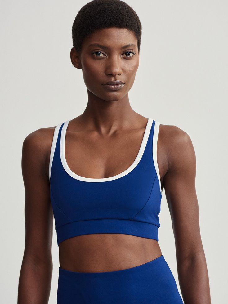 Made in our Move fabric for moisture management and breathability, this bra is perfect for everything from yoga to Pilates. Removable cups allow you to personalise the fit, while a contrast trim adds a unique finish. Blue Stretch Activewear With Built-in Bra, Blue Compressive Sports Bra, Blue Compressive Activewear With Built-in Bra, Compressive Blue Sports Bra, Sweat Resistant, Compressive Blue Moisture-wicking Sports Bra, Cozy Boots, Hair Accessories Gift, Home Sport, Activewear Brands