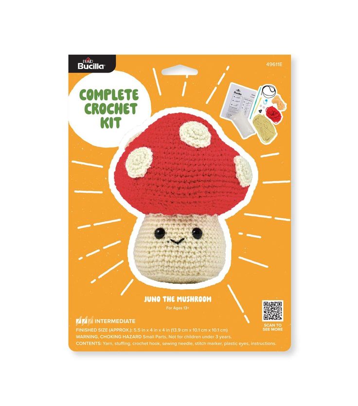 a crocheted toy with a red mushroom on it's head and the words, complete crochet kit