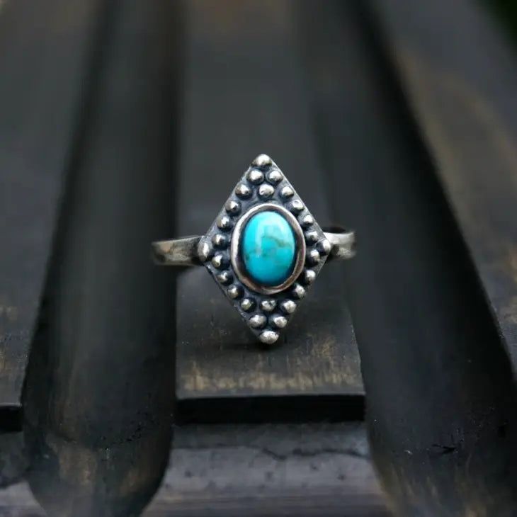 Solid 925 sterling silver. Genuine turquoise from Arizona, USA. Size: adjustable band, fits all sizes. Sterling Silver Turquoise Ring Stamped 925, Turquoise Sterling Silver Ring Stamped 925, Sterling Silver Turquoise Promise Ring, Turquoise Sterling Silver Promise Ring, Adjustable Turquoise Jewelry For Promise Ring, Adjustable Sterling Silver Turquoise Rings, Turquoise Sterling Silver Midi Rings As Gift, Adjustable Turquoise Midi Rings, Unique Adjustable Turquoise Promise Ring