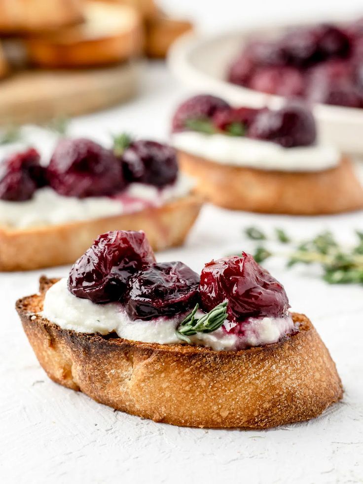 cranberry ricotta dip with roasted grapes on toasted english muffins