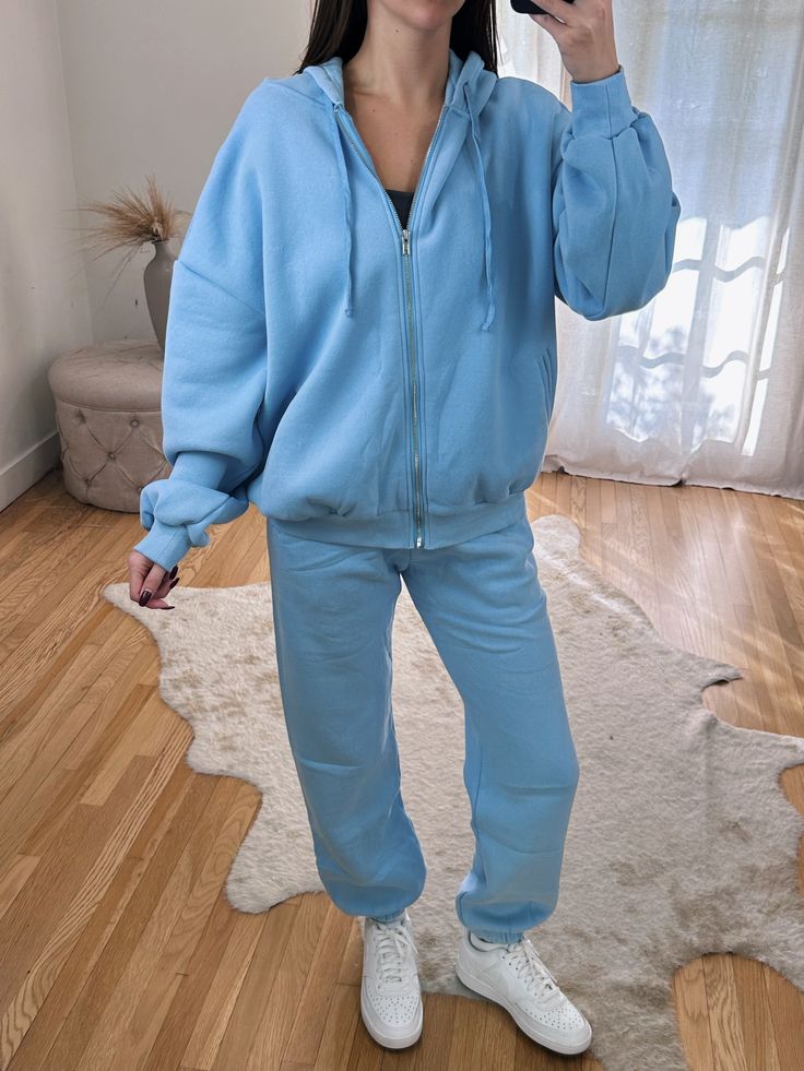 The Perfect New Zip Up to Pair with your Favorite Comfort Collection Bottoms! Full Length Slightly Oversize Zip Up ft. Fleece Lining, Silver Hardware & Hood. So high quality and cozy! Maclaine is 5'7 and wearing a size Small. Model is 5'6 wearing a size large. She typically wears a size XL. Blue Fleece Sweats For Spring, Blue Relaxed Fit Sweats For Winter, Winter Blue Sweats Relaxed Fit, Cozy Blue Sweats For Fall, Comfy Blue Sweats With Ribbed Cuffs, Cozy Blue Outerwear For Loungewear, Comfortable Blue Sweats With Ribbed Cuffs, Comfy Blue Cotton Sweats, Blue Relaxed Fit Athleisure Outerwear