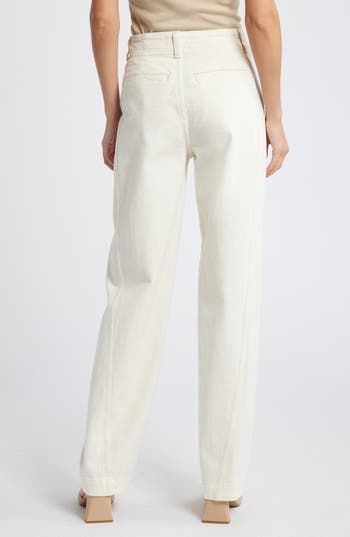 The cut: easy through the hips and thighs, these high-waist jeans have tapered legs, slant pockets, a side panel and welt back pockets. 31 1/2" inseam; 19" leg opening; 12" front rise; 14 1/2" back rise (size 29) Zip fly with button closure Front slant pockets; back welt pockets 98% cotton, 2% elastane Machine wash, tumble dry Imported Classic Cream Jeans For Workwear, Modern Rigid Denim Workwear Bottoms, Spring Rigid Denim Tapered Leg Pants, Spring Tapered Leg Rigid Denim Pants, Classic High Rise Cream Jeans, Rigid Denim Bottoms With Standard Cut Leg For Work, Rigid Denim Bottoms Standard Cut For Workwear, Rigid Denim Standard Cut Leg Workwear Bottoms, Rigid Denim Standard Cut Leg Bottoms For Workwear