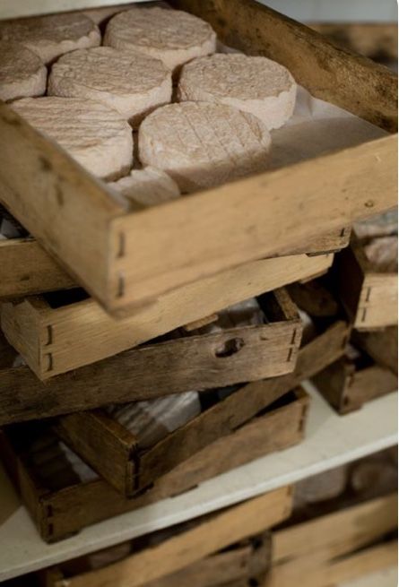 wooden boxes filled with heart shaped cookies sitting on top of each other