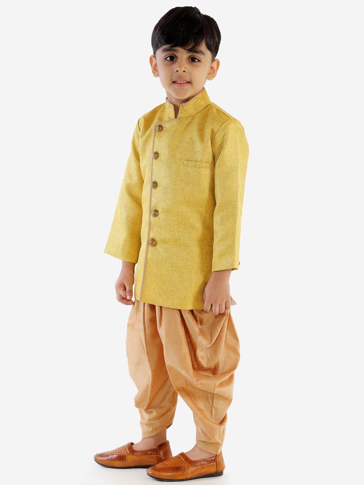 JBN CREATION Boy's Mustard Jute Silk Blend Sherwani Set Enhance your little one's ethnic look with the JBN CREATION Mustard Jute Silk Blend Sherwani Set. Crafted with precision and style, this sherwani set offers a blend of tradition and modernity, perfect for special occasions. Features Elegant mustard color Jute silk blend material Intricate embroidery detailing Comfortable and stylish fit Specifications Brand: JBN CREATION Color: Mustard Material: Jute Silk Blend Sizes Available: Various Mate Yellow Sherwani With Self Design For Eid, Eid Yellow Sherwani With Self Design, Traditional Fitted Bandhgala For Puja, Fitted Sherwani With Zari Work For Puja, Fitted Bandhgala For Puja During Eid, Bollywood Style Gold Bandhgala For Navratri, Fitted Self Design Sherwani For Puja, Fitted Self-design Sherwani For Puja, Fitted Sherwani For Puja During Diwali