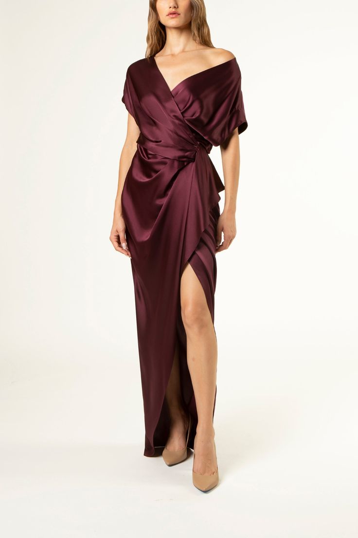 Pure silk charmeuse full length gown with open wrap front neckline. Features a pleated wrap effect skirt with side cascade detail. Invisible zipper closure at center back. Made in USA. Composition: 100% silk Professional dry clean only* Winter Wedding Guests, Michelle Mason, Full Length Gowns, Silk Charmeuse, Merlot, Invisible Zipper, Pure Silk, Winter Wedding, Wrap Dress