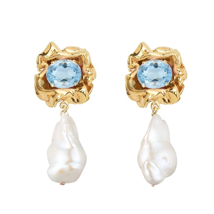 Description The Lola Pearl Drop Earrings feature baroques pearls suspended from rose cut crystals in a ruffled gold setting. Why You'll Love It These earrings are both classic and modern– their unique shapes and glassy crystals add just the right amount of sparkle. Part of our Bridal Edit, the aquamarine crystals add a delicate touch of something blue. Details 14k gold-plated Freshwater baroque pearl– each pearl is unique Glass crystal Post back and butterfly fastening Approximately 1.5" (4cm) d Luxury Pearl Drop Statement Earrings, Luxury Blue Pearl Earrings For Formal Occasions, Luxury Graceful Pearl Drop Earrings, Luxury Statement Drop Pearl Earrings, Luxury Ornate Pearl Drop Earrings, Luxury Chic Drop Pearl Earrings, Luxury Pearl Drop Earrings For Statement Jewelry, Luxury Classic Bridal Earrings With Gemstones, Affordable Chic Blue Earrings