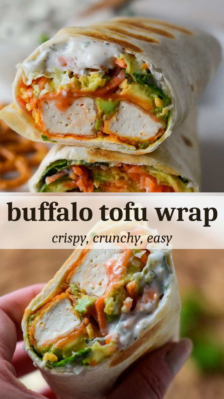 a hand holding up a burrito with the words buffalo tofu wrap