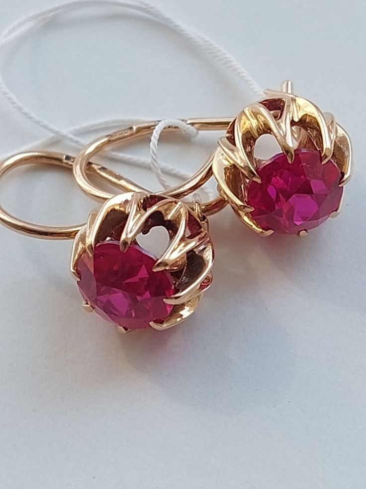 Vintage 14K Beautiful Water Lily Earrings Ruby Corundum USSR 583 Rose Gold Soviet Retro Russian Women's jewelry, Vintage gift for woman and girlBase Metal: Gold 14K (Russian Hallmark: 583 Star with Sickle and Hammer)Base Stone: Ruby LAB (synthetic)Manufacturer Country: USSR Soviet Union RussiaTotal weight: 4.33 g.Enjoy your shopping! Formal Pink Gold Gemstone Earrings, Ruby Earrings With Prong Setting, Gold Earrings With Prong Setting In 14k Rose Gold, Elegant Ruby Jewelry In Pink Gold, Rose Gold Ruby Earrings For Gifts, Elegant Pink Gold Ruby Jewelry, Fine Jewelry Pink Gold Gemstone Earrings, Pink Gold Gemstone Earrings In Fine Jewelry Style, Rose Gold Ruby Round Earrings