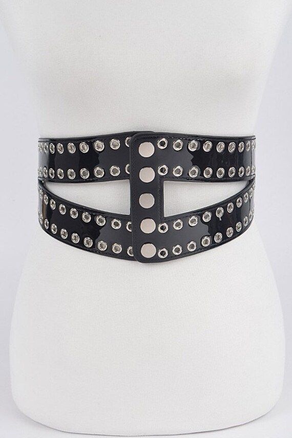 "Corset stretch belt with eyelet.  50% pu  30% elastic  20% iron  Approx. width 5\" length: 31.5\"" Adjustable Corset Belt For Spring, Trendy Adjustable Corset Belt With Belt Loops, Party Belts With Rivets, Trendy Corset Belt With Belt Loops For Party, Trendy Spring Corset Belt With Belt Loops, Stretch Belt, Fashion Belts, Women Bags Fashion, Suspender Belt