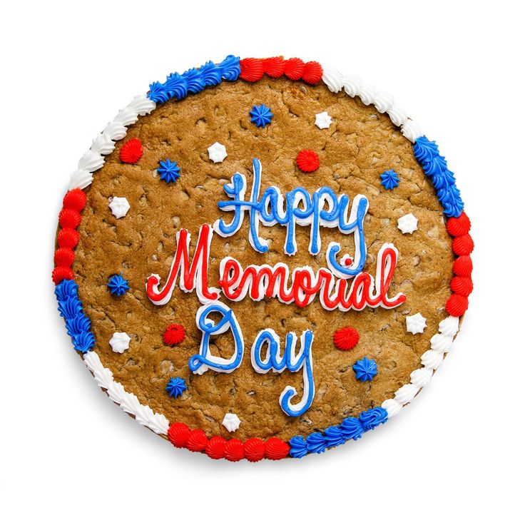 a cookie cake with the words happy memorial day written in red, white and blue frosting