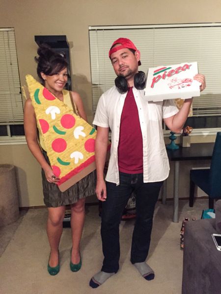 the man and woman are dressed up as pizzas for their halloween costume party,