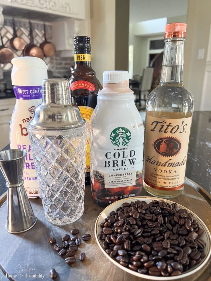 coffee beans, cold water, and other ingredients on a table in a home kitchen