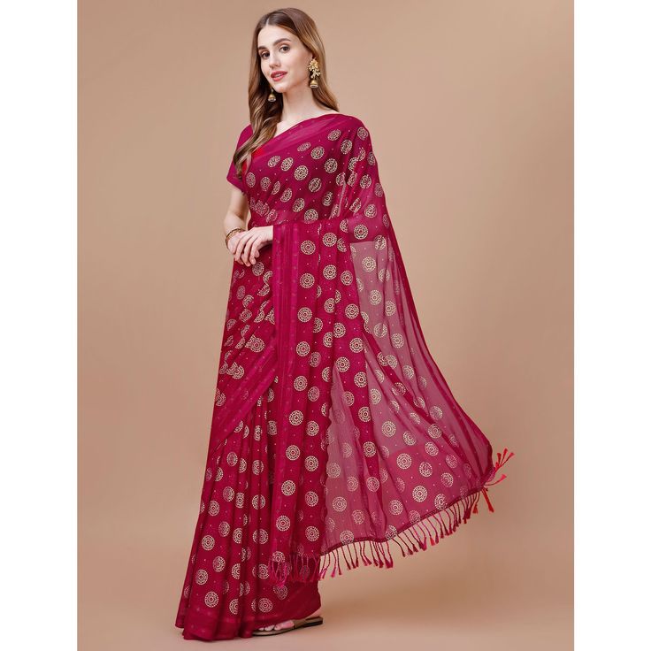 Magenta colored saree is prettified with beautiful foil printed work as shown which makes it appear classy. This saree is made of chiffon silk fabric which is accompanied with dola silk blouse piece which you can customise as per your design/style. Women can buy this saree to wear for their festive and functions. Note:- The actual product may differ slightly in color and design from the one illustrated in the images when compared with computer or mobile screen. Measurements: Saree : Chiffon : 5.5 Mtrs Blouse : Chiffon : 0.8 Mtr Material: Chiffon Stitch Type: Unstitched Country of Origin: India Care Guide: Dry Clean Festive Bandhani Print Georgette Pre-draped Saree, Celebration Saree With Bandhani Print And Traditional Drape, Bandhani Print Pre-draped Saree For Puja, Party Bandhani Print Pre-draped Saree, Semi-stitched Chiffon Pre-draped Saree For Festivals, Party Pre-draped Saree With Bandhani Print, Party Wear Bandhani Print Georgette Saree, Party Georgette Saree With Bandhani Print, Party Saree With Bandhani Print On Georgette