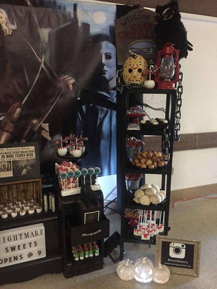 an assortment of harry potter treats on display in front of a movie poster and other items