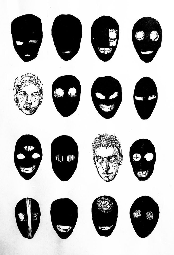 a bunch of masks with faces drawn on them