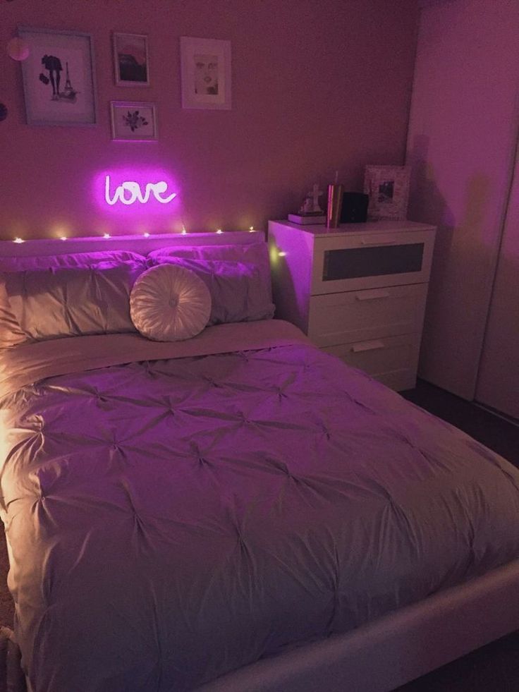 a bed that has some lights on it