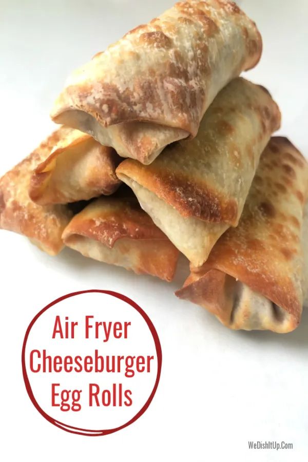 four pieces of fried cheeseburger egg rolls stacked on top of each other with the words air fryer cheeseburger egg rolls below