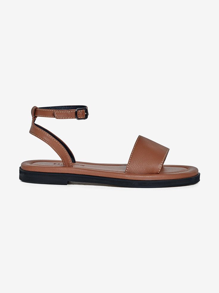 Editor's NoteNeute designs shoes with the natural luxury of leather.- Classic and daily sandals- Sophisticated stitch line detail- Comfortable and stable fit with buckle strap- Soft and smooth goat skin used Measurements (in.)- Size: KR 220MM - KR 260MM (35 - 39)- Heel Height: 0.98 in. Composition & Care- Upper: Goat Skin, Lining: Pig Skin, Sole: Suede Sole- All products are hand-made, so sewing and finishing may not be uniform, and double stitching, fine pen marks, and removable b Brown Sandals With Heel And Ankle Strap, Classic Brown Slingback Sandals With Round Toe, Brown Slingback Sandals With Ankle Strap And Leather Sole, Modern Brown Sandals With Heel Strap, Leather Flat Heel Slingback Sandals With Adjustable Strap, Classic Brown Flat Heel Sandals, Calf Leather Slingback Sandals With Ankle Strap, Modern Brown Slingback Sandals With Ankle Strap, Brown Slingback Sandals With Buckle Closure