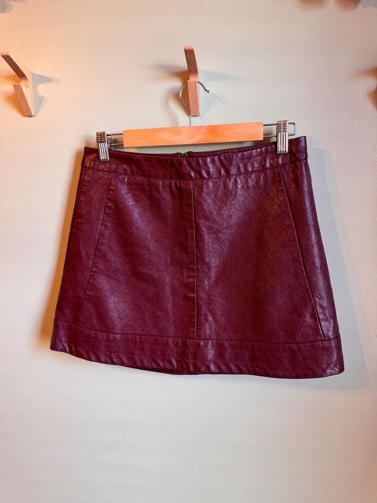 Jolt burgundy faux leather mini skirt. Perfect for fall with a sweater & boots! Burgundy Leather Pleated Skirt, Burgundy Skirt Plus Size, Maroon Leather Skirt Outfit, Maroon Leather Skirt, Leather Skirt Outfit, Maroon Leather, Faux Leather Mini Skirt, Leather Mini Skirt, Sweater Boots