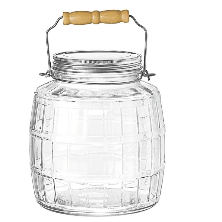 a glass jar with a wooden handle