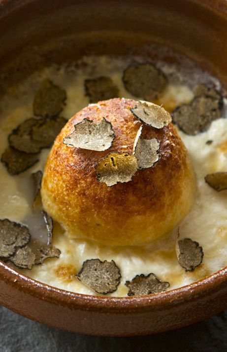 a bowl filled with food on top of a table