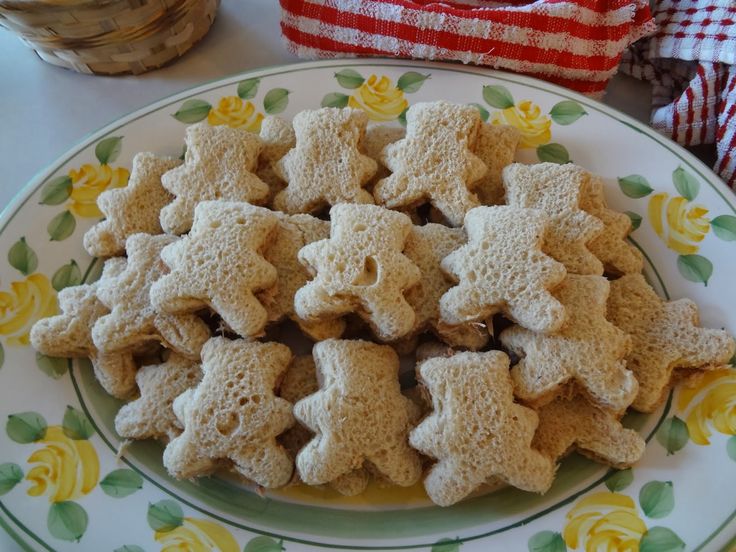 a plate full of cut up cookies on a table