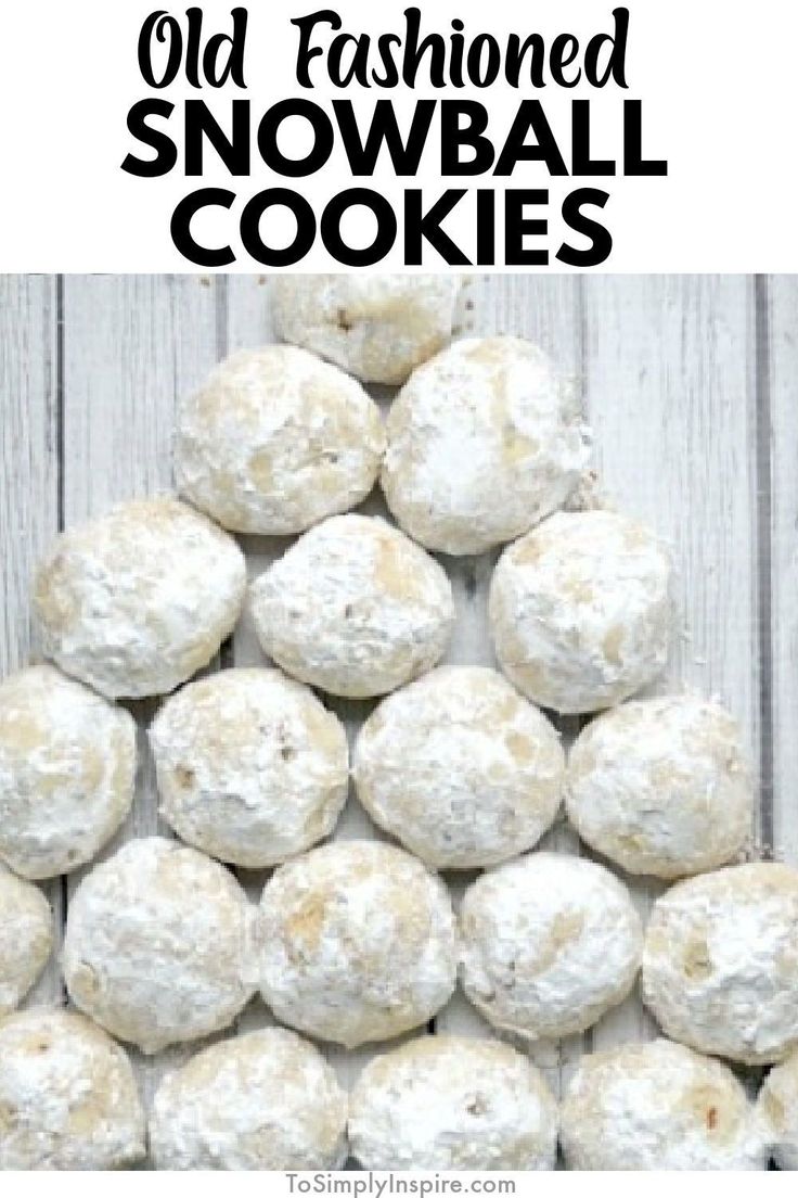 old fashioned snowball cookies on a white wooden table with text overlay that reads old fashioned snowball cookies