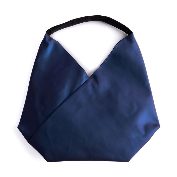 The asymmetric design with the bevel triangle gives this super light bag a pyramidal shape, great styles for this straight shoulder bag. The soft, flexible strap can be worn wide or this to accommodate any shoulder shape for a comfortable fit against the body. This bag features 1 main compartment closes with magnet snap, 1 additional internal zipped pocket, and 1 additional internal open cellphone pocket. Modern Triangle Shoulder Bag With Removable Pouch, Modern Triangular Shoulder Bag With Removable Pouch, Triangle Shoulder Bag With Removable Pouch For Travel, Modern Triangle Shoulder Bag For Evenings, Modern Triangle Shoulder Bag For Evening, Elegant Triangular Everyday Bag, Elegant Everyday Triangle Bag, Versatile Everyday Triangle Shoulder Bag, Chic Triangle Shoulder Bag For Everyday Use