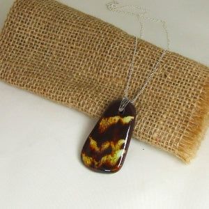 Fair Trade Bold Pendant Necklace Brown Nickel-free Brown Necklace For Gift, Nickel-free Brown Jewelry For Gifts, Handmade Brown Rectangular Jewelry, Artisan Brown Necklace With Oval Pendant, Brown Necklace With Large Pendant As Gift, Brown Necklace With Large Pendant For Gift, Unique Nickel-free Brown Jewelry, Unique Brown Nickel-free Jewelry, Handmade Brown Rectangular Necklaces