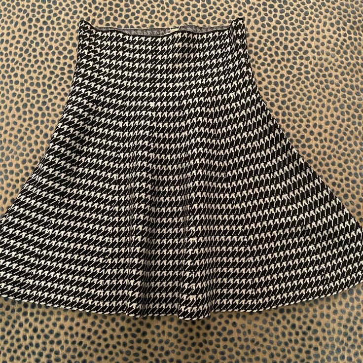 A Great Skirt! Brand New. I Would Pair With A Black Turtleneck And A Red Lip Of Course. Fall Fitted Skirt With Houndstooth Pattern, Fitted Houndstooth Skirt, Fitted Mini Skirt With Houndstooth Pattern, Fitted Houndstooth Mini Skirt, Casual Black Houndstooth Mini Skirt, Chic Fitted Houndstooth Skirt, Black Houndstooth Mini Skirt, Black Mini Skirt With Houndstooth Pattern, Fitted Black Mini Skirt With Houndstooth Pattern