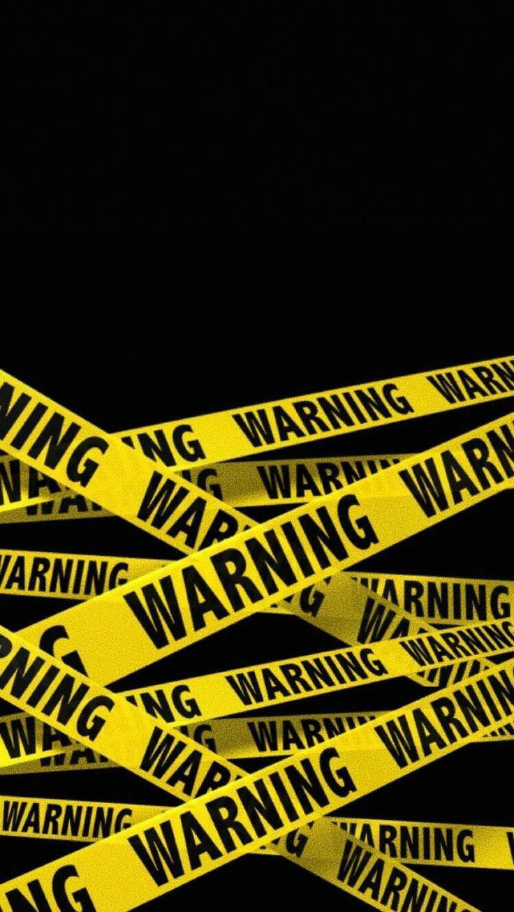 yellow caution tape with warning words on it in front of a black background that says, no waring