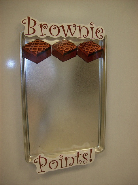 a mirror that has been decorated with brownie poins and the words brownie poins on it