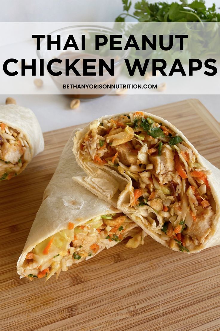 there is a wrap with chicken in it on the cutting board next to another wrap