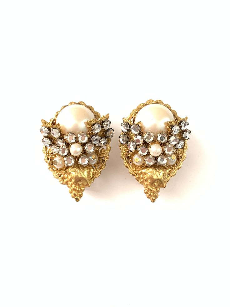 "Gorgeous Vintage Gold Filigree Pearl Clip Earrings, Haskell Style Clip Earrings, Wedding Earrings They measure a little shy of 1\" wide at widest point and 1 3/8\" long.  They have clip on style backs.  The pearls are faux pearls.  These are gorgeous new old stock earrings, overall, very good vintage condition.  All items such as boxes, coins, etc., in photos are NOT included with the jewelry, they are props being used for display. ALL SALES ARE FINAL Please read all shop policies, ALL TERMS  BELOW and item descriptions PRIOR to purchase.  My PRICES ARE FIRM, please do not message me with an offer or for a coupon code.  Cancellation/Return Policy: I do not accept cancellation or returns.  I do not accept returns because of skin allergies, turning skin green, black etc. Everyone is differe Large Jewelry, Gold Filigree, Earrings Wedding, Short Necklace, Jewelry Companies, Moon Pendant, Clip Earrings, Matte Gold, Wedding Earrings