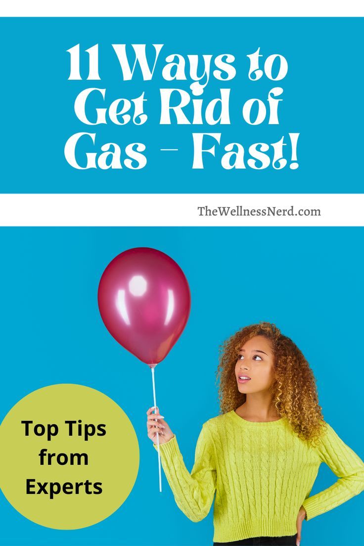 Woman holds a pink balloon against a blue background. How To Help Gas Pains, Remedies For Bloated Stomach And Gas, Trapped Gas In Stomach, Pass Gas Relief, Painful Gas Relief, Gas Remedies For Adults, How To Get Rid Of Gas, Foods That Cause Gas, Gas And Bloat Relief